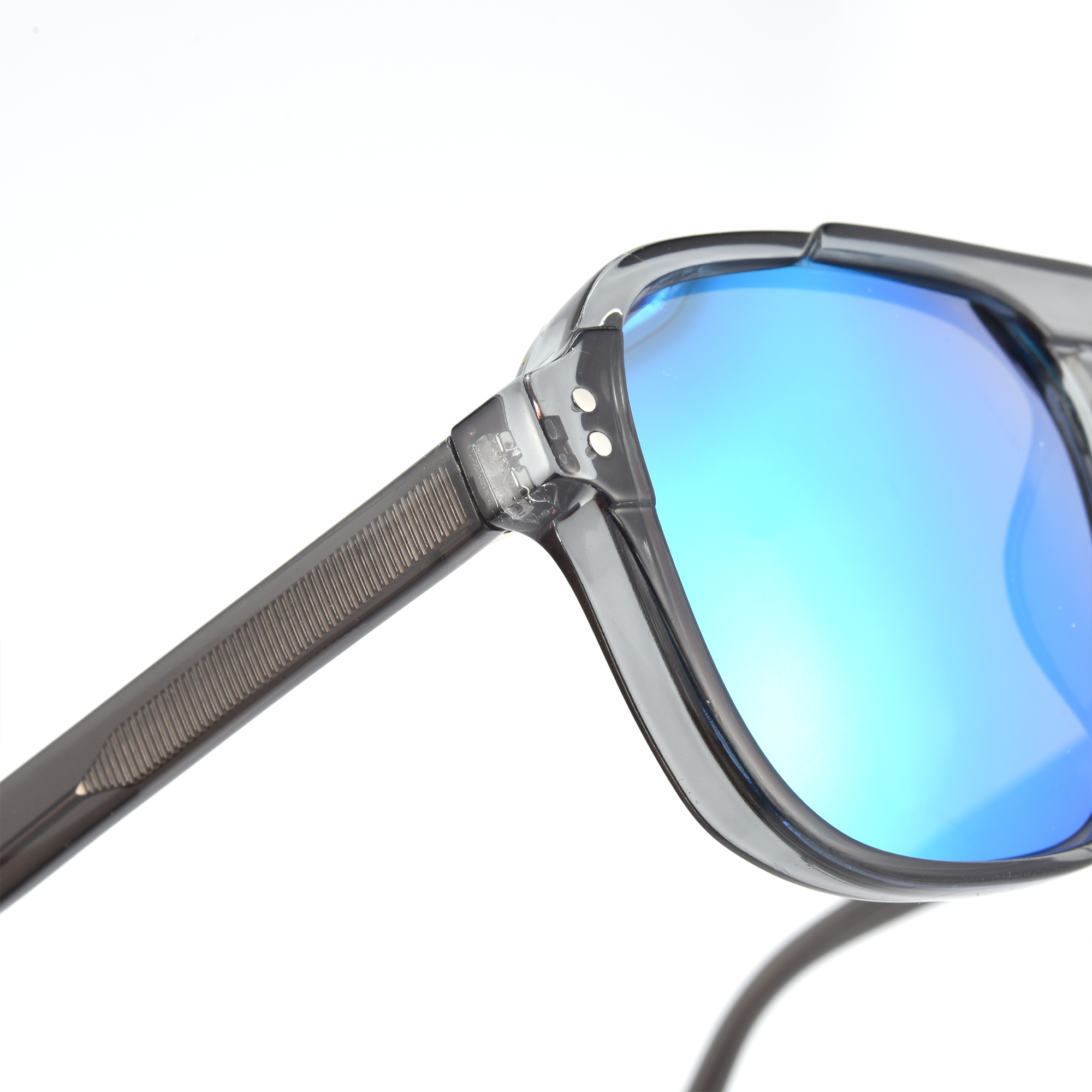 London Aviator black and blue lense close up 2 Close-up of stylish blue-lens sunglasses.