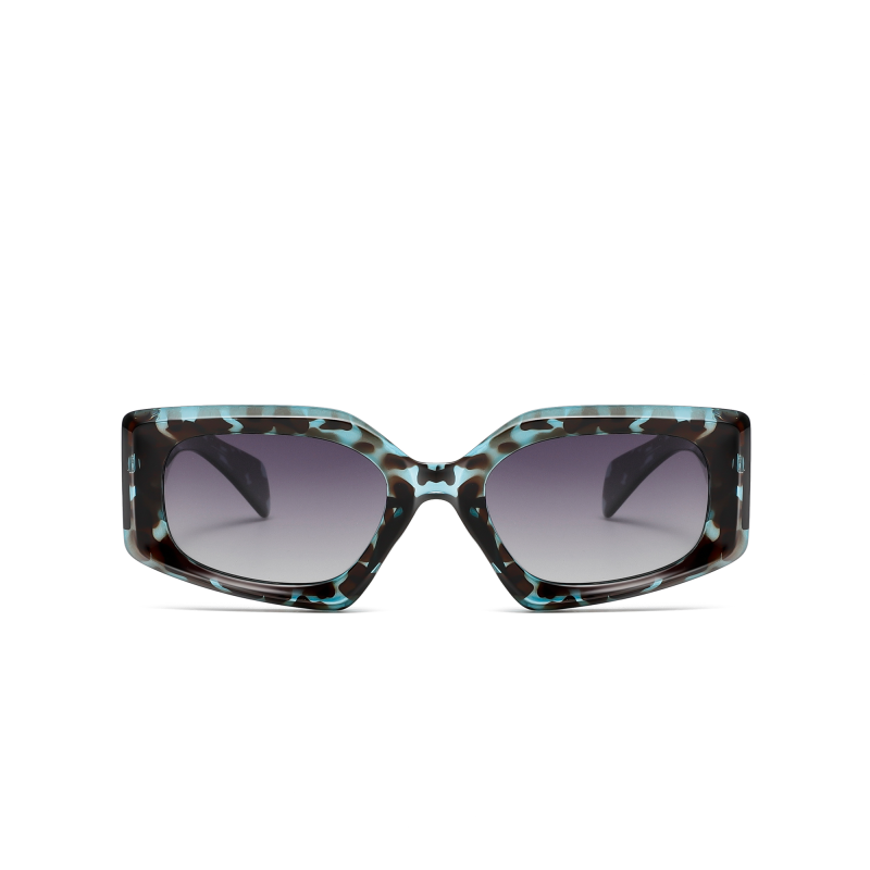 Stylish tortoiseshell sunglasses with gradient lenses.