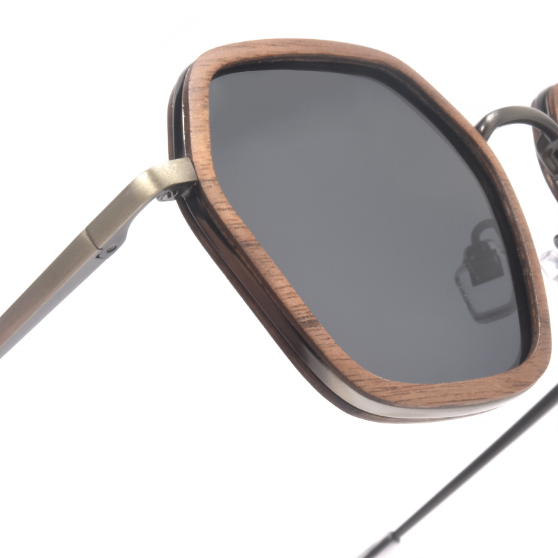 Stylish sunglasses with wooden frames close-up view