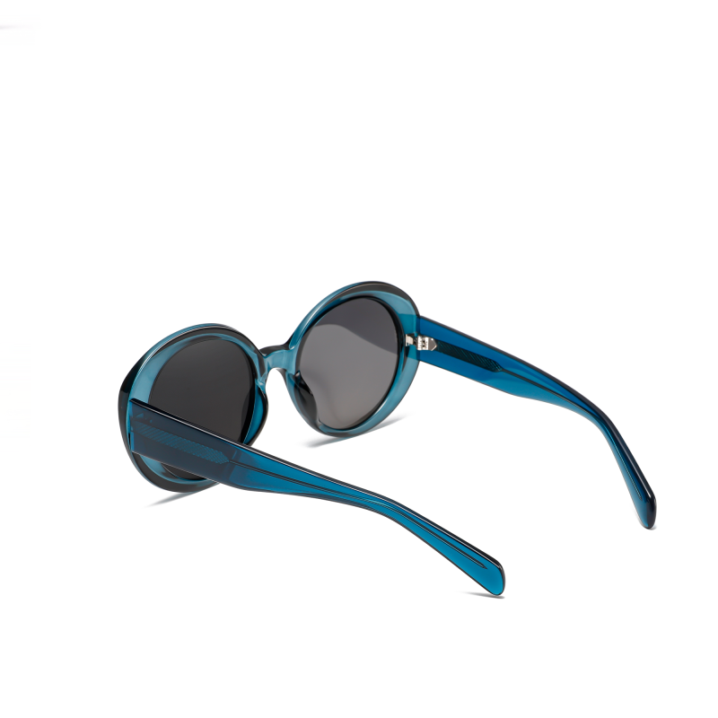 Stylish round blue sunglasses with dark lenses.