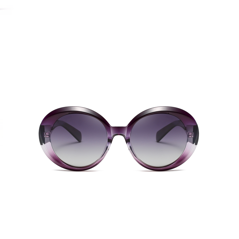 Purple round sunglasses with gradient lenses.