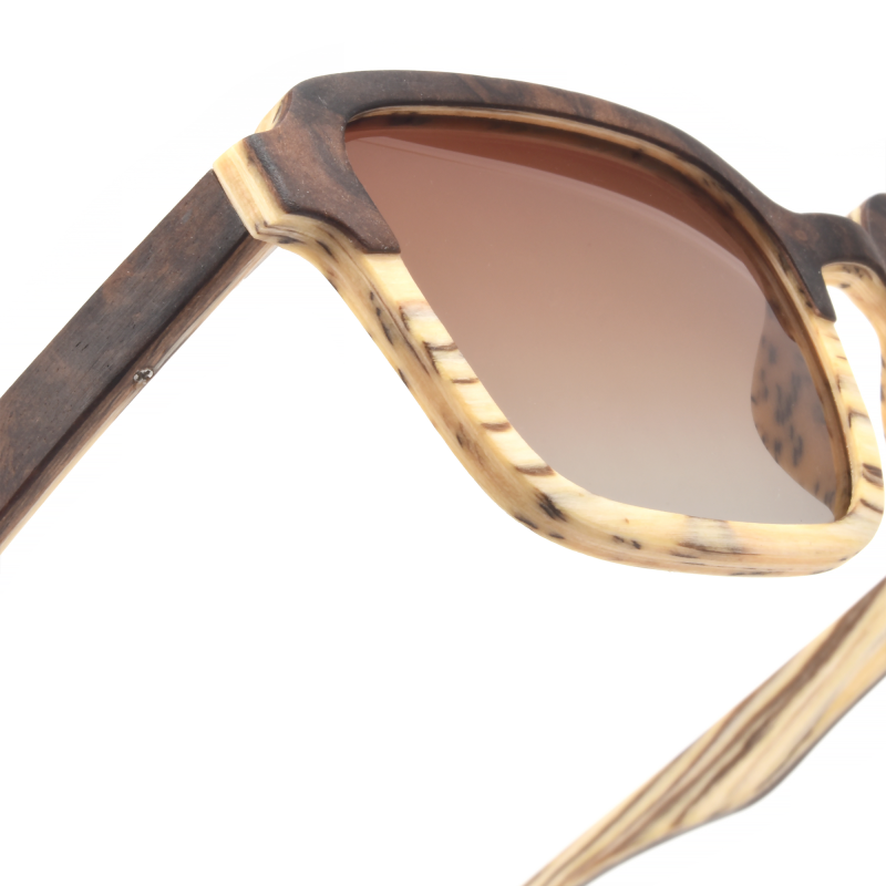 Stylish wooden sunglasses with gradient lenses.