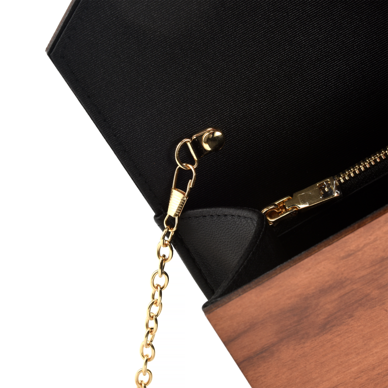 Elegant purse with golden chain and zipper detail