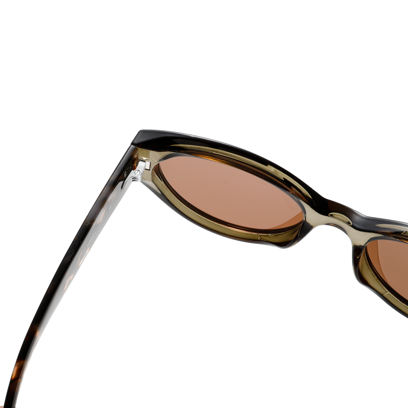 Close-up of stylish sunglasses with tinted lenses.