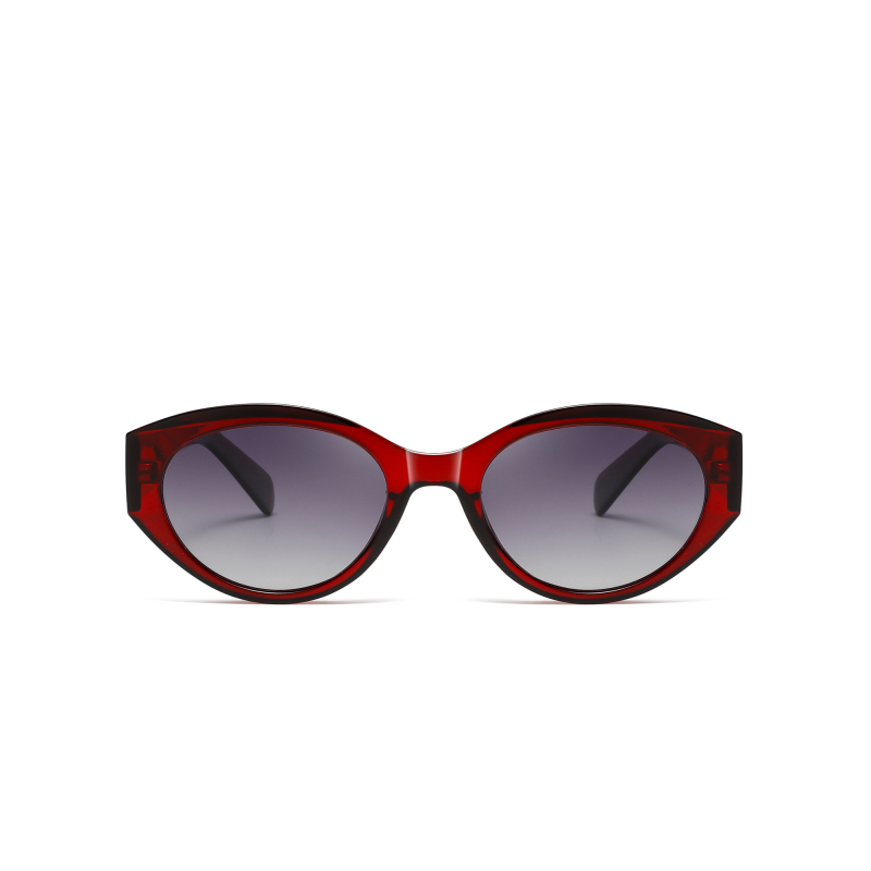 Red cat-eye sunglasses with dark lenses.