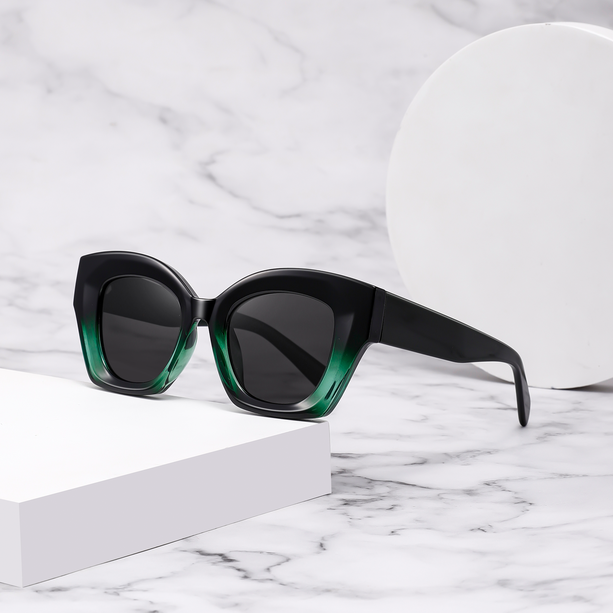 Rathbone by Find unsual graident green Black sunglasses with green gradient on marble background.