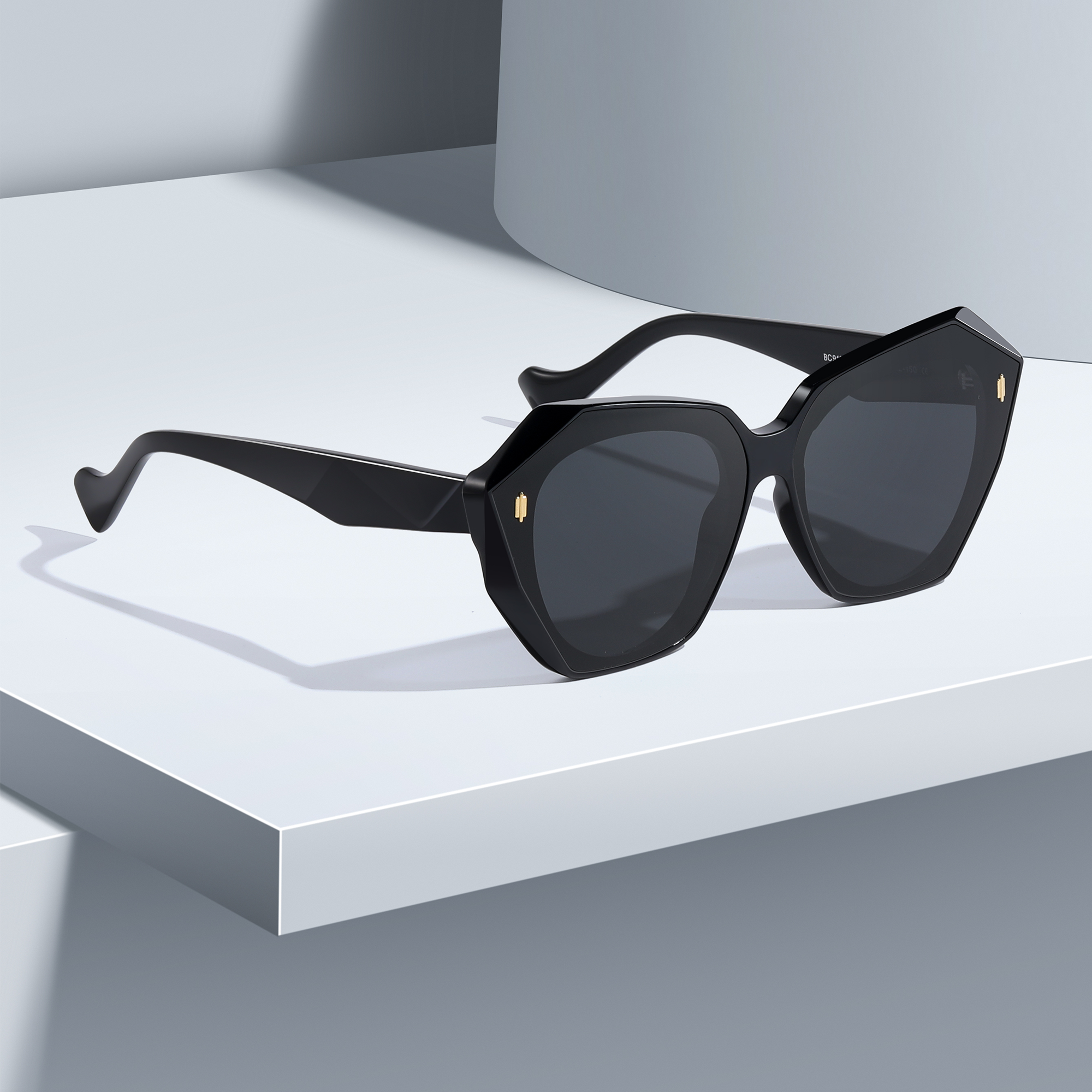 mercer by find unusual black lifestyle Black sunglasses on minimalist white surface