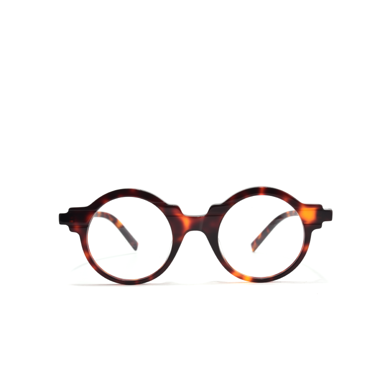Round tortoiseshell eyeglasses on white background.