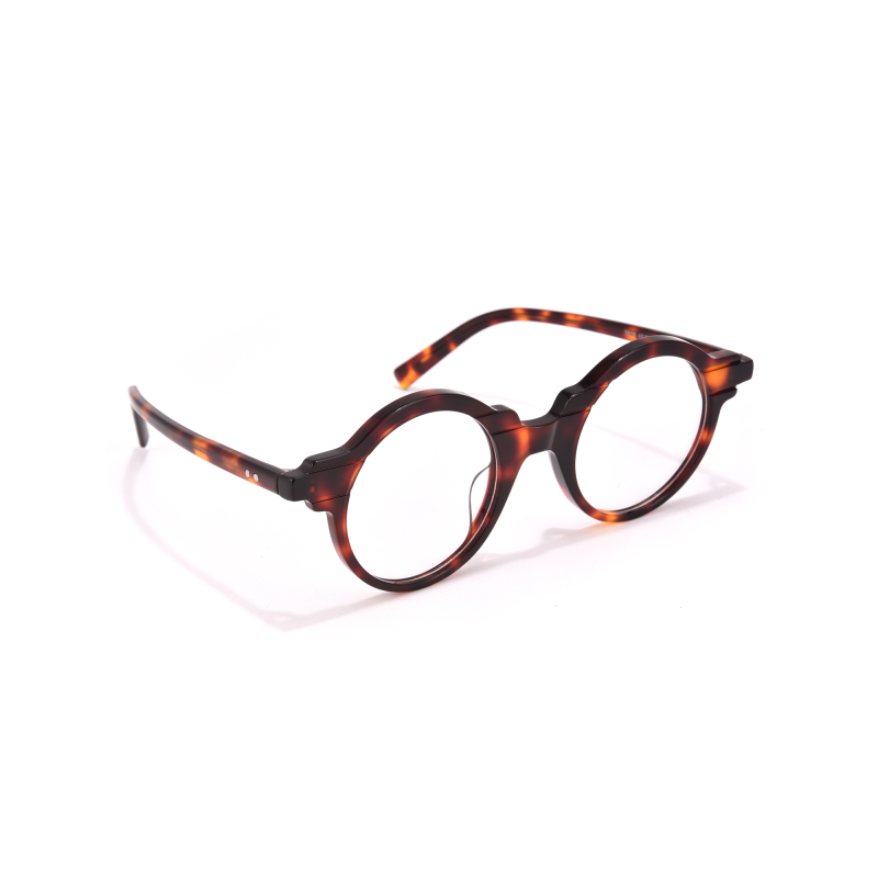 Round tortoiseshell glasses on white background
