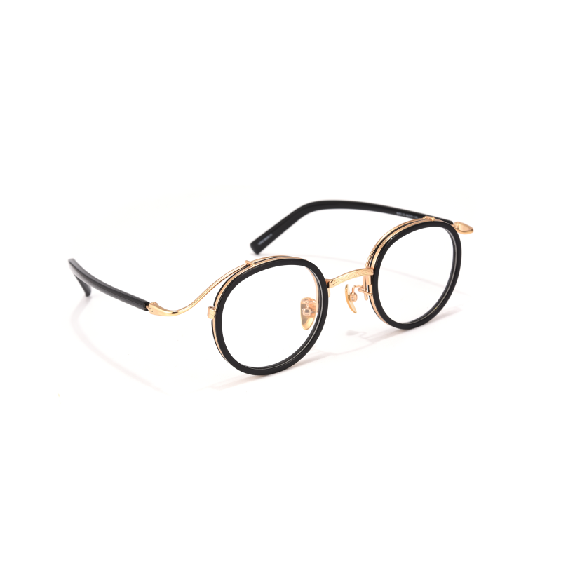 Black and gold oval glasses
