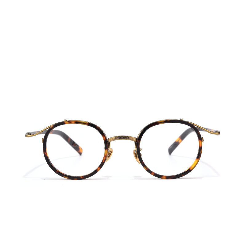 Round tortoiseshell eyeglasses on white background