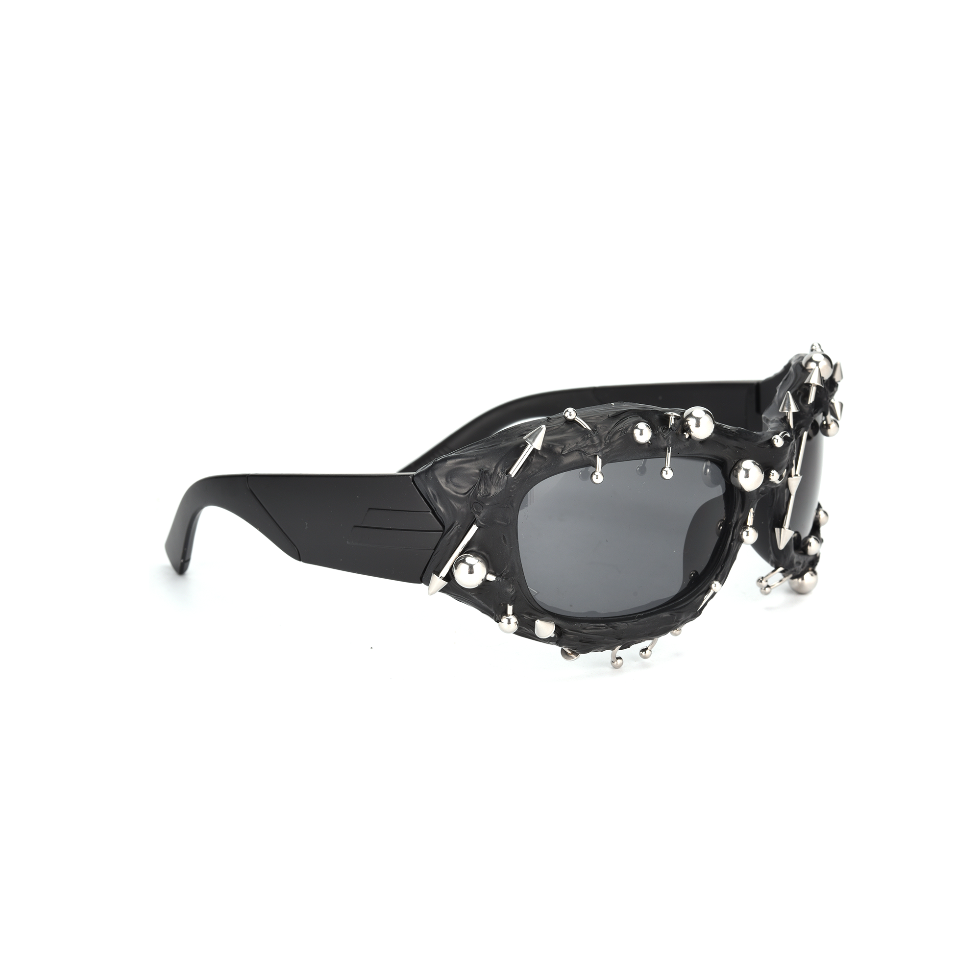 Renegade black side view Stylish black sunglasses with silver decorative accents.