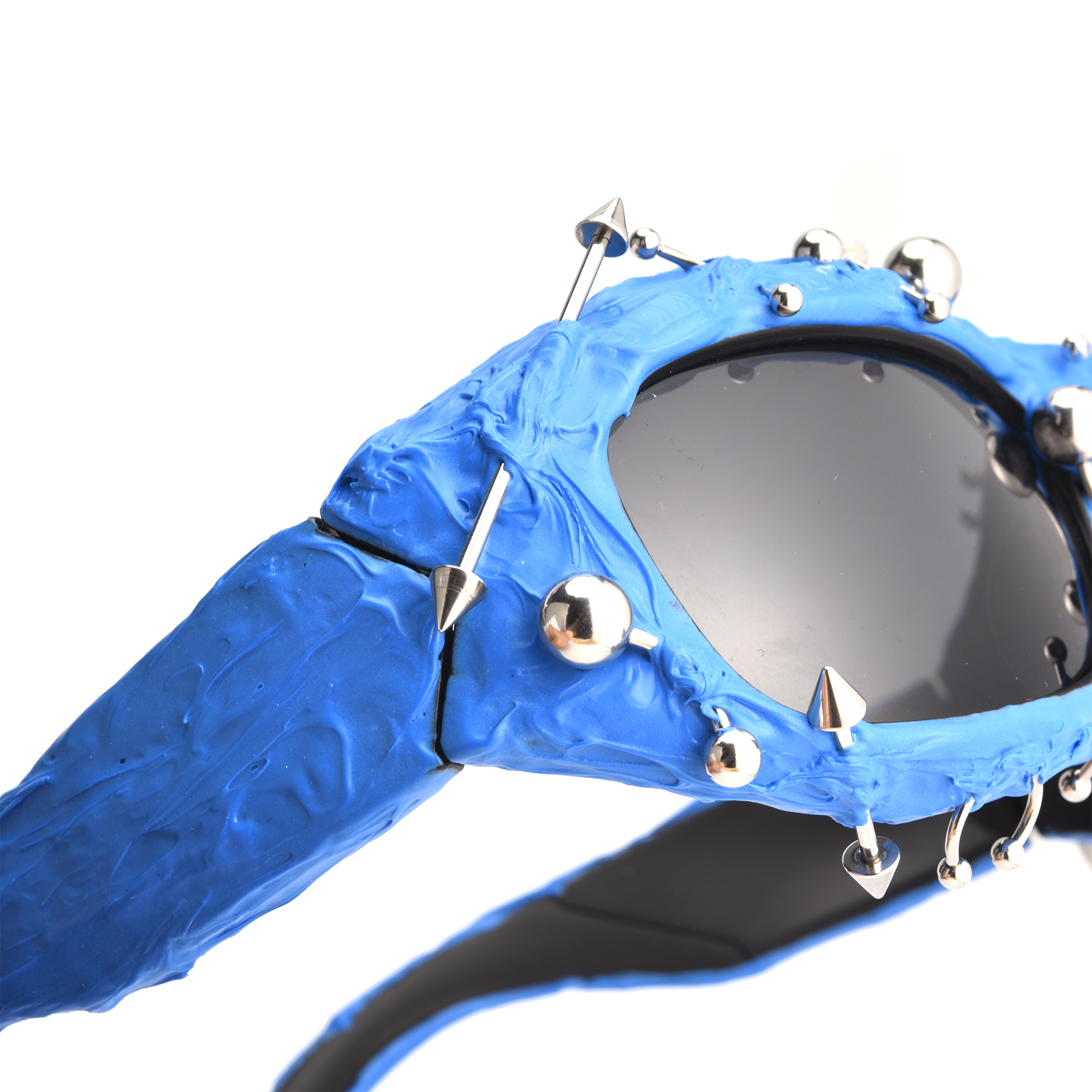 Renegade blue close up Blue spiked sunglasses with silver studs.