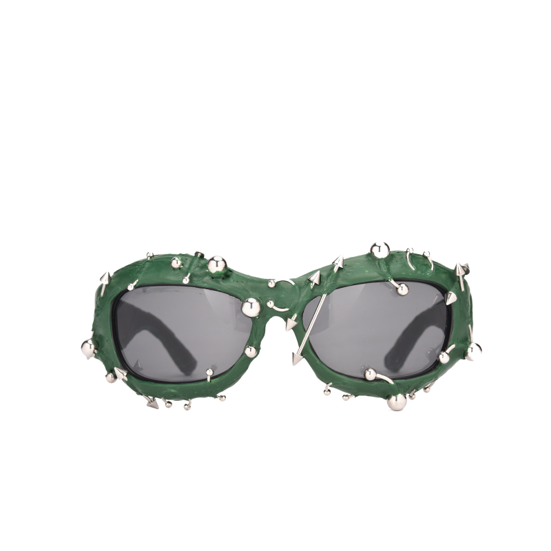 Spiked green sunglasses with metal decorations