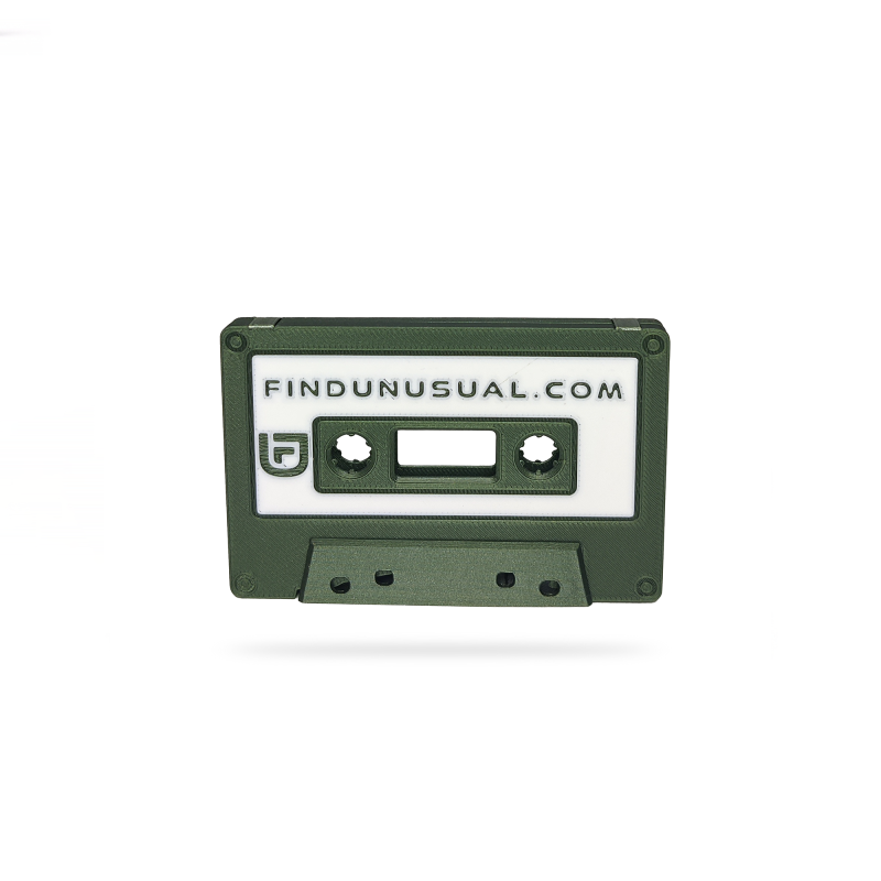 Green cassette tape with 'findunusual.com' label.