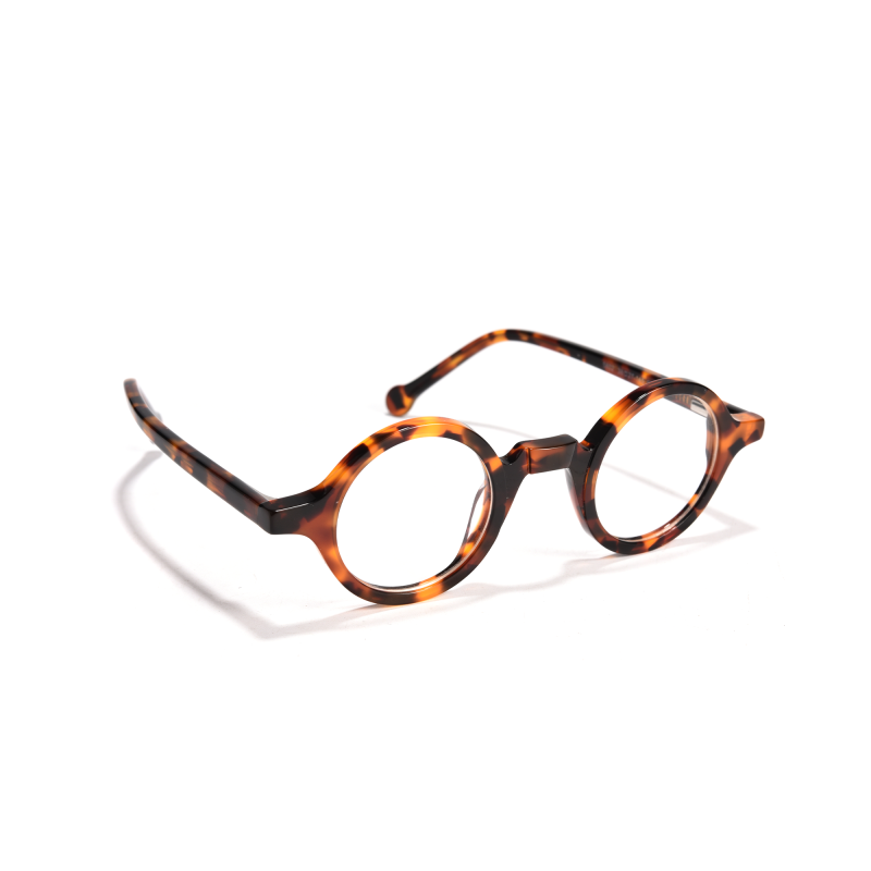 Round tortoiseshell glasses on white background