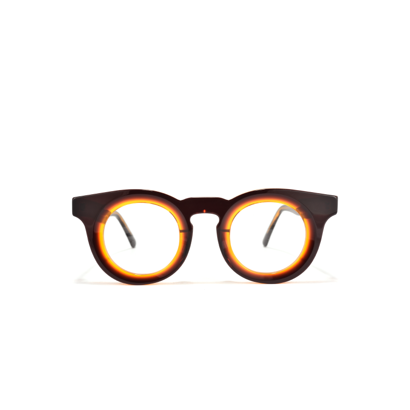 Round tortoiseshell eyeglasses on white background