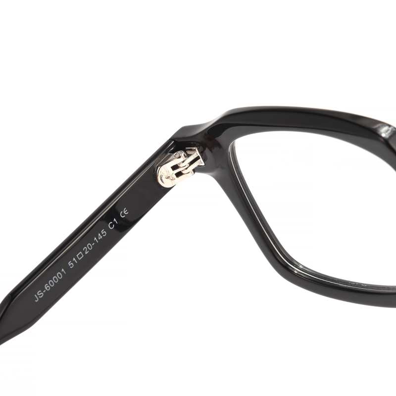 Close-up of black eyeglass temple with markings.