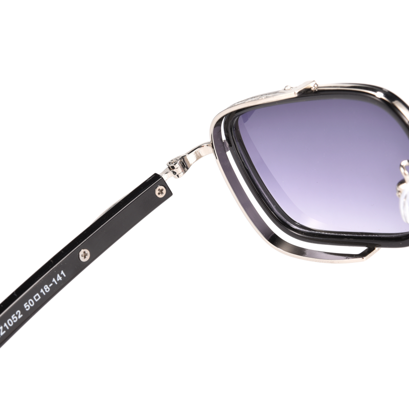 Close-up of stylish sunglasses with gradient lenses.