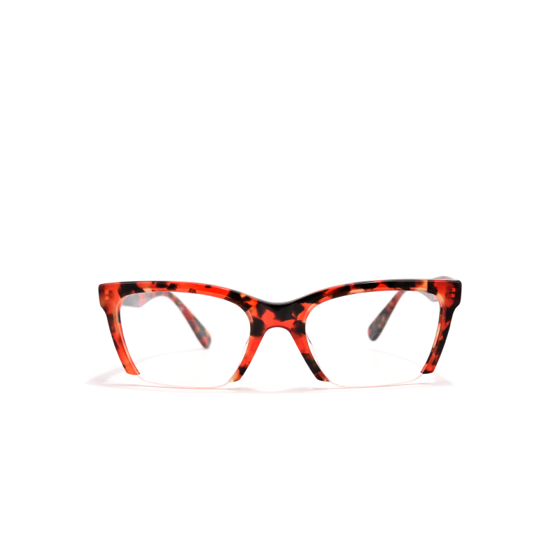 Red tortoiseshell eyeglasses on white background.