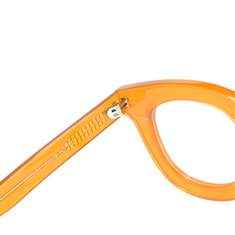 Orange eyeglass frame with metal hinge detail.