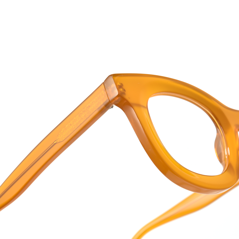 Close-up of orange sunglasses frame.