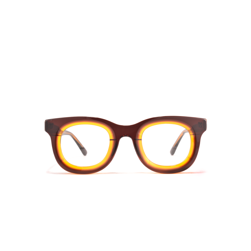 Brown eyeglasses with orange-accented frames