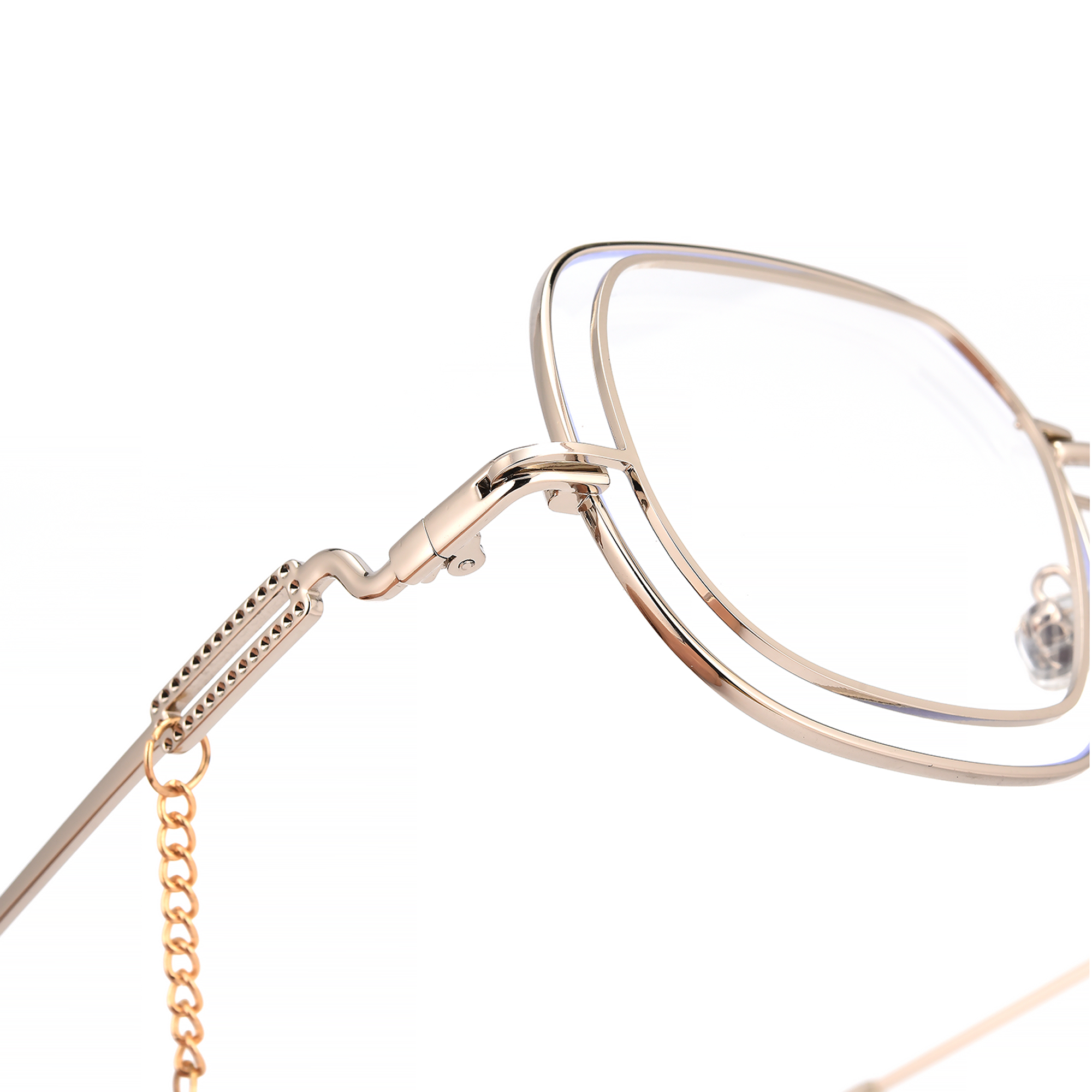 clarendon close up 2 Close-up of gold eyeglasses with decorative chain