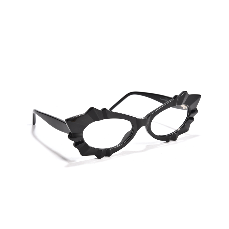 Black spiky cat-eye glasses on white background.