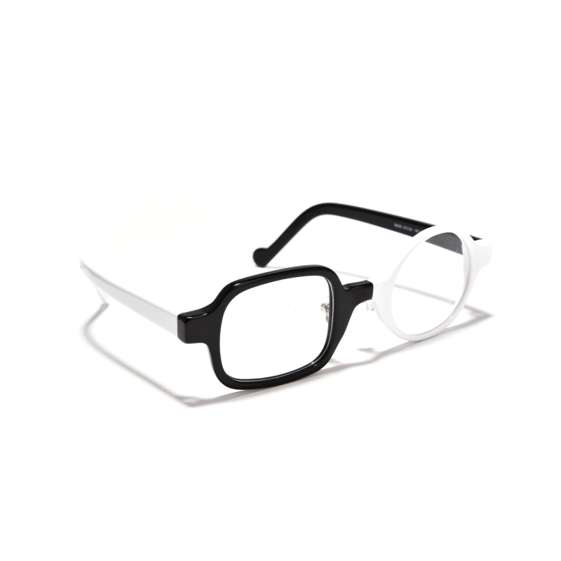 Black and white asymmetrical eyeglasses on white background.